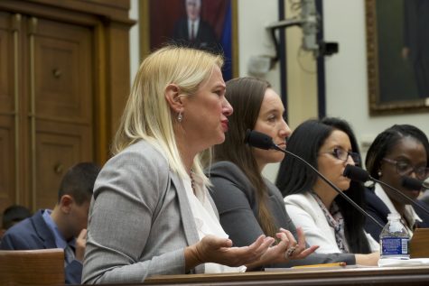  Kate Ranta, testifying about domestic violence in the military she endured before the House Armed Services Subcommittee on Military Personnel. (Miranda Mahmud/Gaylord News)