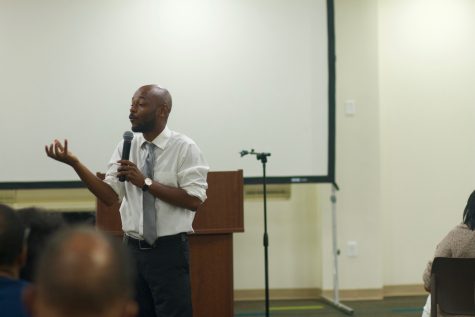 Rev. Michael Wortham, College and Young Adult Pastor, presents a message on faith and politics at the mid-week service.