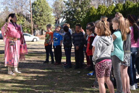 Tracey Satepauhoodle-Mikkanen, Executive Director of the Jacobson House, teaches students.