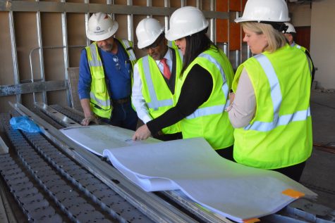 Graduate program faculty go over plans for the new center