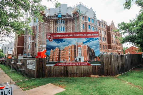 A rendering of Dunham College is displayed in front of the Residential Colleges building site. Headington College and Dunham College will stretch along Lindsey Street from Asp Avenue to Jenkins Avenue.