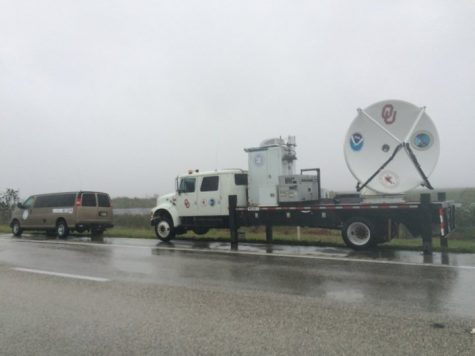 Two of the three vehicles the group of meteorologists took sit on the side of the road in Fort Lauderdale, Florida during Hurricane Irma. Photo provided by Mike Biggerstaff.