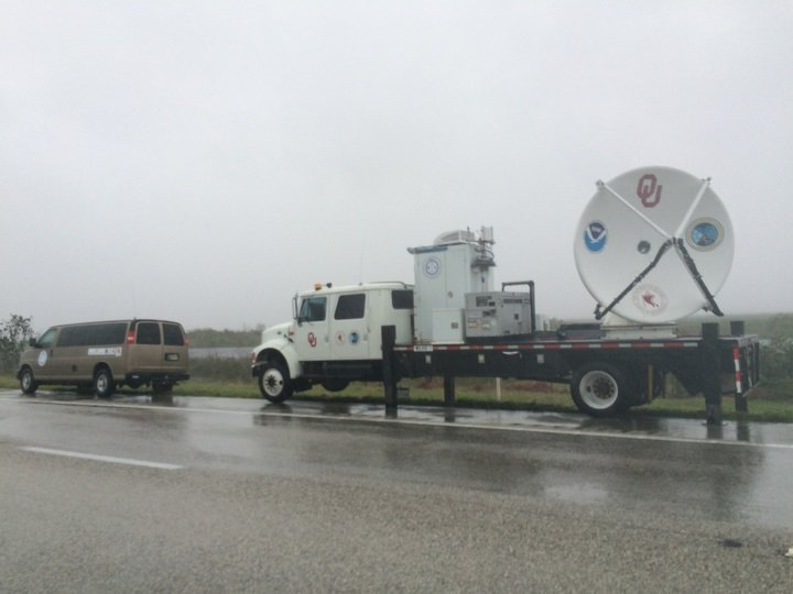 Two of the three vehicles the group of meteorologists took sit on the side of the road in Fort Lauderdale, Florida during Hurricane Irma. Photo provided by Mike Biggerstaff. 
