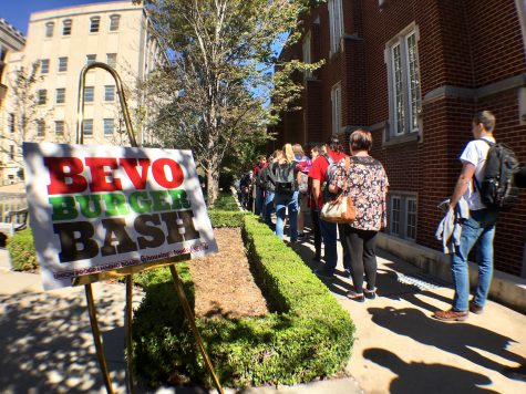 OU students, faculty and staff waiting in line in the Oklahoma Memorial Union Courtyard for the Union Programming Board’s event, “Bevo Burger Bash”.