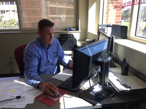 Ben Bigelow, Haskell & Irene Lemon Construction Science Division director, works in his office in the College of Architecture on Oct. 11. Bigelow used a computer program to determine who the groups would be able to help.