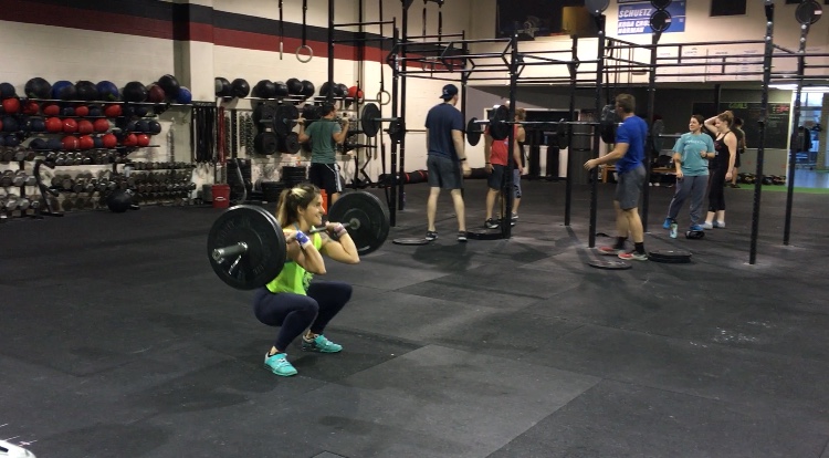 Customers get a workout in during one of the afternoon classes at Koda CrossFit Norman.
