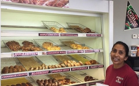 Jasi Patel prepares to serve a customer at Donut King Friday, Nov. 3. Jasi and her sister-in-law have co-owned Donut King since 1993. 