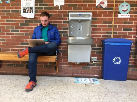An OU student studies next to one of the six water refill stations in Dale Hall.
