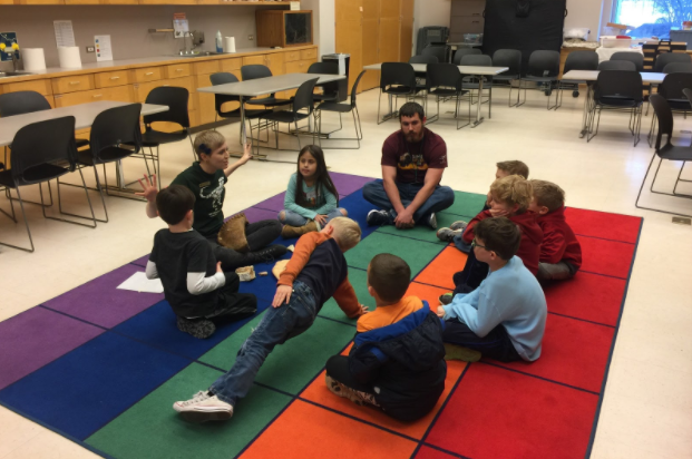 Spike’s Club students learning about different animals that lived during ice ages.