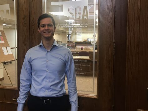 Student Government Association President Yaseen Shurbaji poses for a picture outside the SGA office in the Conoco Student Leadership Center of the Oklahoma Memorial Union Sept. 13.