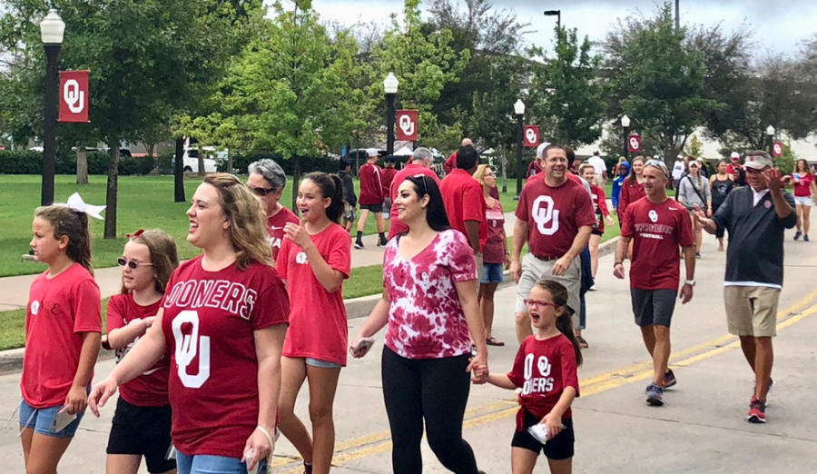 University of Oklahoma alumni and children stroll towards the football stadium to watch OU versus UCLA on Sept. 8, 2018, in Norman. This was the Sooner’s second game of the season. 