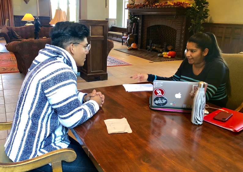 Amandeep Kaur, Campus Activities Council Spark chair, discusses plans for the leadership and volunteerism program with Ismael Gomez, CAC Spark executive vice chair on Oct. 11, 2018, in the Oklahoma Memorial Union. The first Spark meeting will take place in November. 