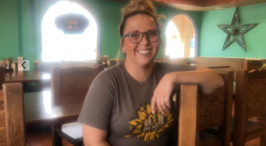 Amanda Hernandez, the manager and co-owner of Restaurante Rio’s in New Cordell, Oklahoma, sits at a table after finishing her lunch shift on Nov. 8, 2018. Photo by Addison Kliewer.