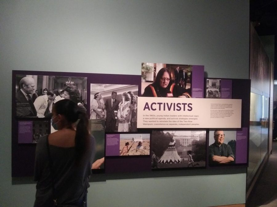A+young+woman+observes+the+Activists+collage+on+the+fourth+floor+of+the+National+Museum+of+the+American+Indian+in+Washington%2C+D.C.+Activists+include+Ladonna+Harris%2C+Reuben+A.+Snake%2C+Suzan+Shown+Harjo%2C+and+Vine+Deloria+Jr.%C2%A0+Photo+courtesy+Gaylord+News+%2F+Jessie+Christopher+Smith