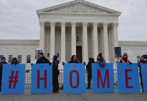 Dozens of individuals hold signs in front of the U.S. Supreme Court on Nov. 12, as a crowd advocates for justices to uphold the Obama-era DACA program. Addison Kliewer/Gaylord News.
