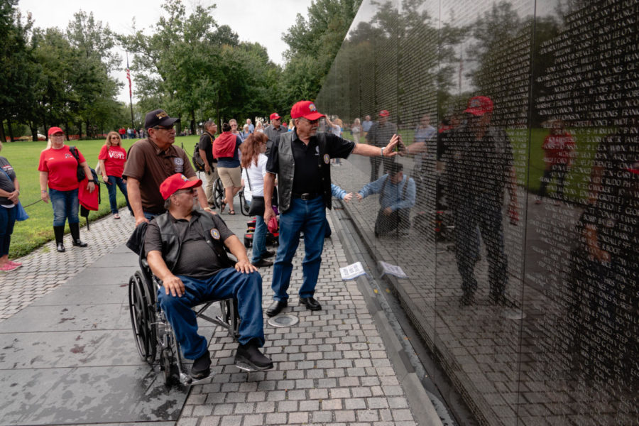 S. Joe Crittenden, Deputy Principal Chief of the Cherokee Nation, places a hand on the wall of the Vietnam Veterans Memorial. (Megan Ross / Gaylord News)