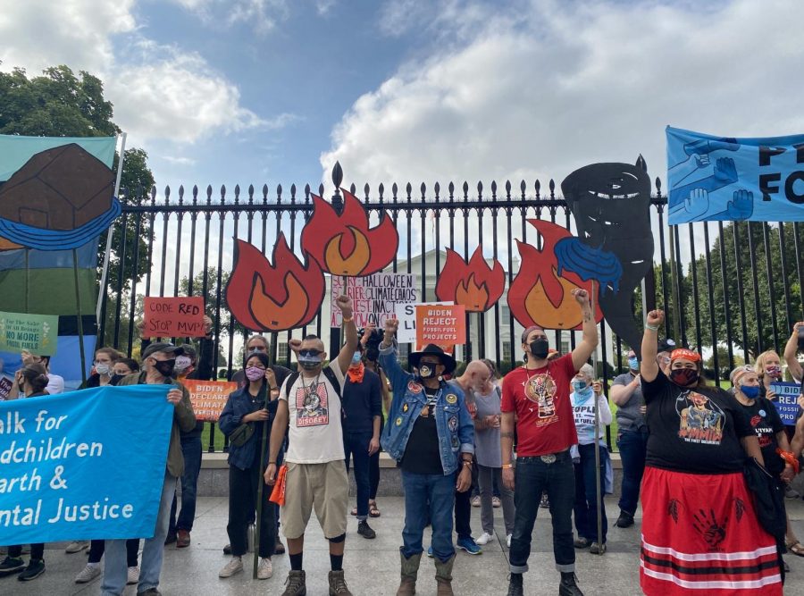 Indigenous environmental activists and allies protest in front of the White House at the People Vs. Fossil Fuels rally. (Robert Viamontes/Gaylord News)