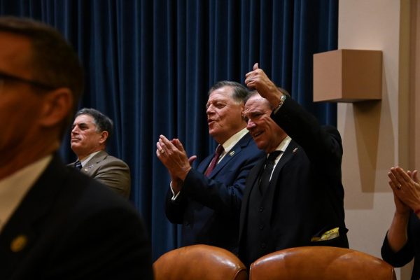 Representative Tom Cole (R, Moore) claps and cheers for Rep. Mike Johnson’s (R, LA) Republican Conferences nomination for Speaker of the House of Representatives Tuesday night. Julia Manipella/Gaylord News