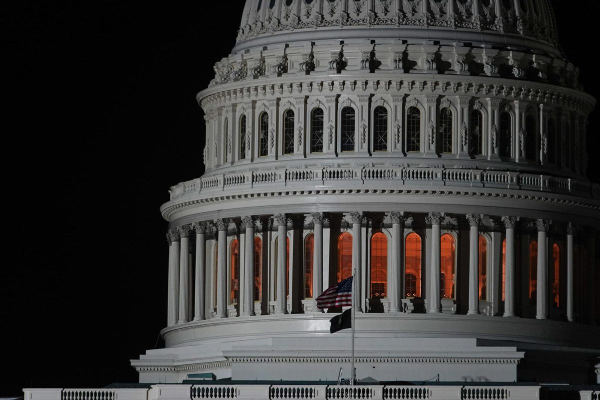 U.S. flag flies over the Capitol. Michael Buchanan/Gaylord News.