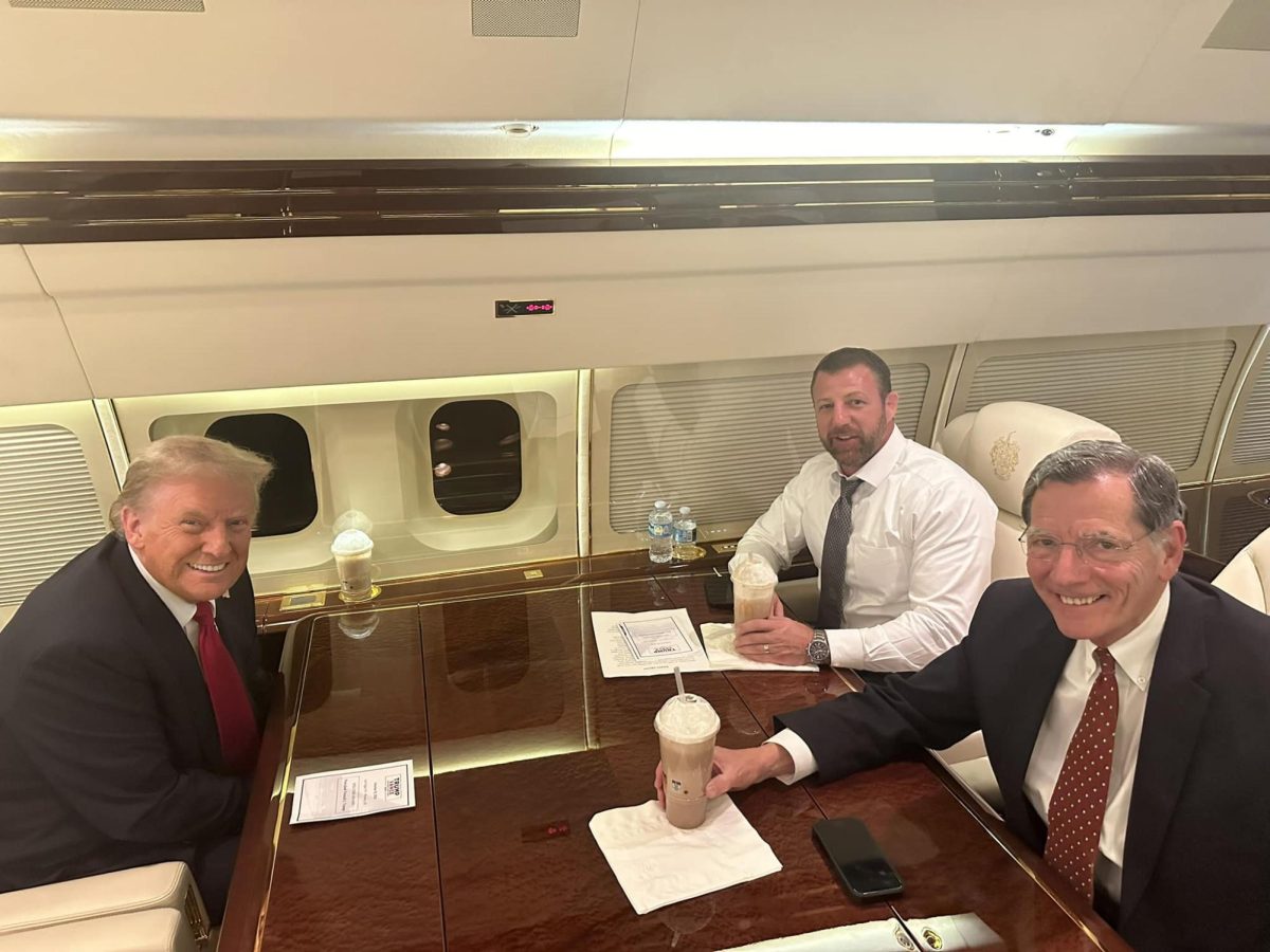 Senator Markwayne Mullin, a longtime ally of President-elect Donald Trump, drinks a milkshake with Trump and Senator John Barrasso (R-Wyoming) on Trump’s plane, Trump Force One, on the way to Arizona days before the election.