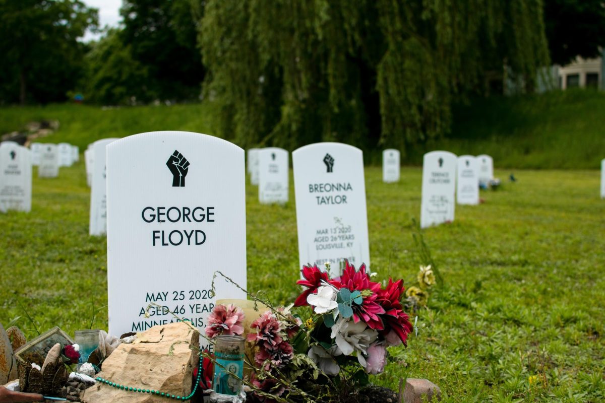 George Floyd's memorial headstone in the "Say Their Names" cemetery near George Floyd Square. The cemetery memorializes the lives of those who died due to police brutality. PHOTO: Maria Nairn 