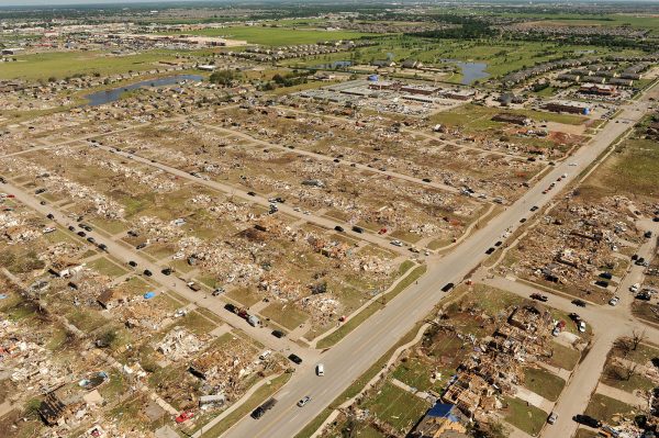 Aerial view of the damage caused by an EF5 tornado that touched down in Moore, Oklahoma on May 20, 2013, in which 24 people died.  (Jocelyn Augustino/FEMA/Wikimedia Commons)