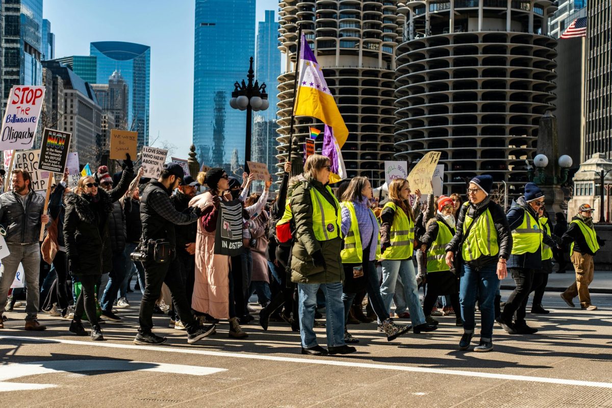 Protesters demonstrate against the National Guard and ICE being deployed in Chicago.