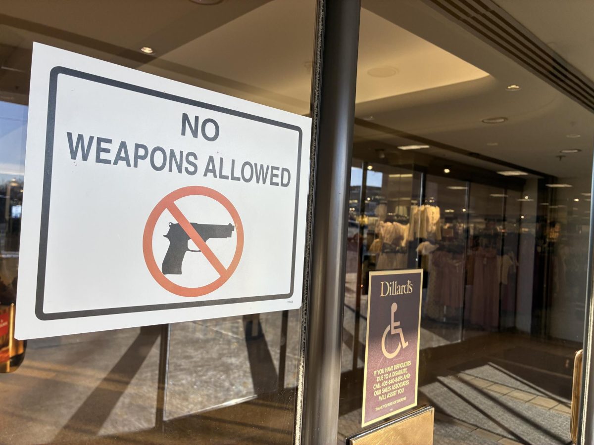 Sign explicitly prohibiting weapons in Penn Square Mall, Oklahoma City.