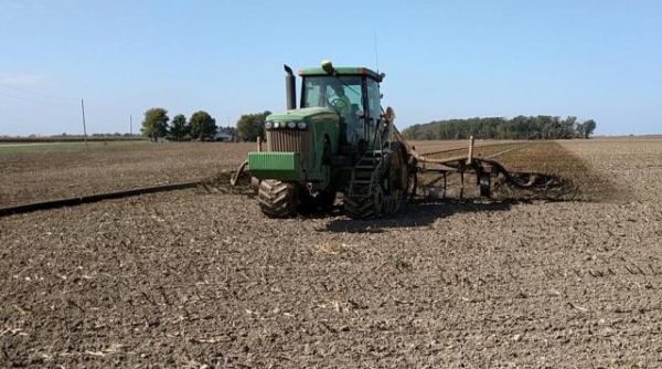 Oklahoma farmer plows field preparing for spring planting.  (OSU Extension Service/Gaylord News)
