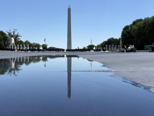 Washington Monument reflects on Reflecting pool as water begins to collect at the deeper portion.  Gaylord News Photo/Cate Slabotsky 