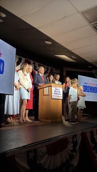 Attorney General Gentner Drummond addresses supporters alongside family members after advancing to an Aug. 25 Republican gubernatorial runoff during his election night watch party June 16, 2026, in Tulsa. Gaylord News / Brook Blach